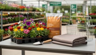 Bundled home and garden items on a patio table, including potted annuals, potting soil, a trowel, and a weather-resistant cover with a blurred garden center background.